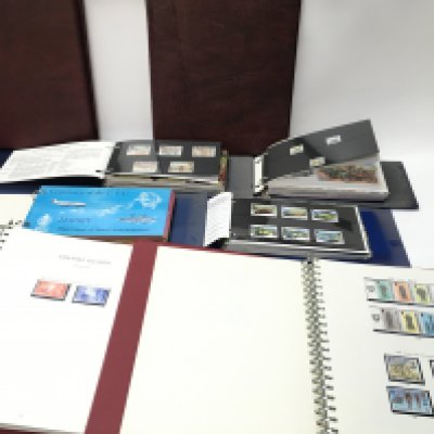 A collection of isle of man Jersey etc stamps and albums. Postage B
