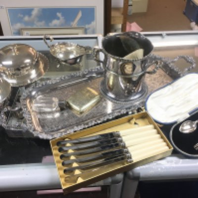 A Collection of silver plate including a tray, dishes, knives and a cased silver hallmarked spoon and fork. Postage category C