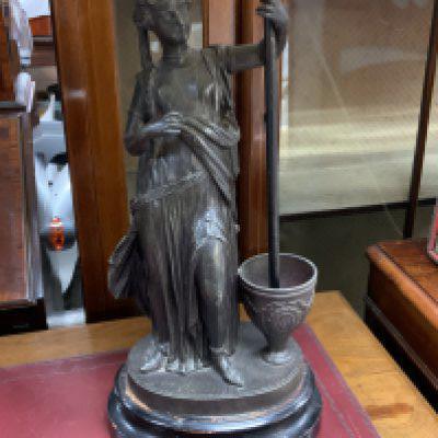 A vintage classical style lady lamp. (D) NO RESERVE