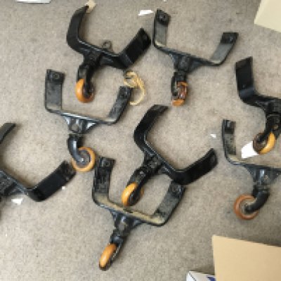 A Collection of cast iron olive wood bed casters. This lot cannot be posted. NO RESERVE