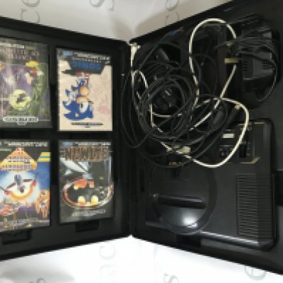 Two playworn Sega saturns with games.