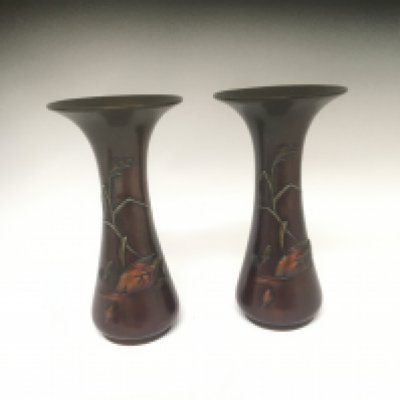 A Pair of Japanese early 20th century bronze vases decorated with raised waterfowl with foliage. Height 25cm