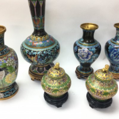 Six Chinese cloisonn&eacute; vases in various sizes and designs.