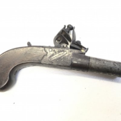 An early 19th century flintlock pocket pistol with retractable trigger screw barrel the action stamped Conway Newcastle action functional proof marks to the underside of the barrel.