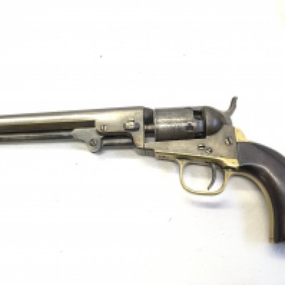 A really nice example of a 19th Century Colt revolver serial number 166016 the serial number on all parts brass trigger guard action etc. The barrel engraved with horse drawn carriages Address stamp on barrel Sam Colt New York City.