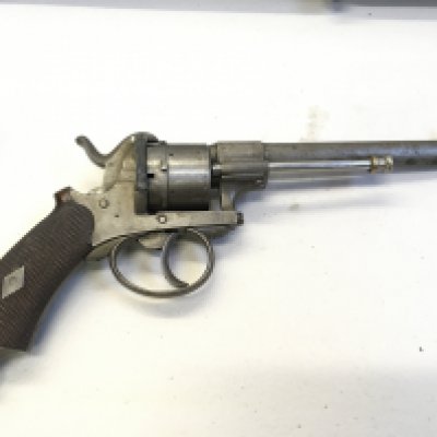 A 19th century pin fire Continental revolver.