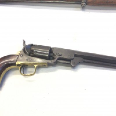 A Nice Example of an Antique 19th century Colt percussion revolver the octagonal barrel stamped Address Sam Colt New York City with conforming serial numbers 87952 on the action barrel and brass grip.stamped Colt Patent.
