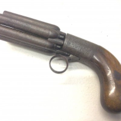A continental 19th century Antique six shot percussion revolver with a walnut grip the steel action with engraved decoration functioning action. With proof marks possible Belgium.