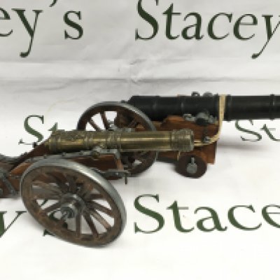 Two models of cannons, approx length 28cm. Shipping category B.
