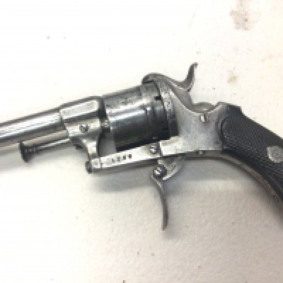 An Antique 19th century rim fire pistol serial number 5286 action non functional.