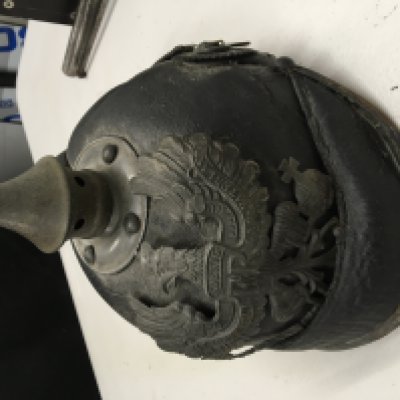 A Genuine battle field find A First World War pickelhelm helmet.