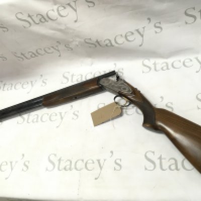 A 12 gauge over under shotgun by ARMI Bettinsoli. Single trigger multi choke. 28 barrel length and 44.5 inches overall. Serial number 63750 PLEASE NOTE THAT A SHOTGUN LICENSE IS REQUIRED TO PURCHASE THIS ITEM. COLLECTION AND VIEWING BY APPOINTMENT ONLY.