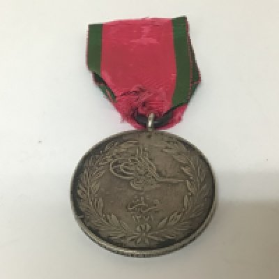 A Crimea 1855 medal awarded to Sergt T H Burke 49th Reg T.
