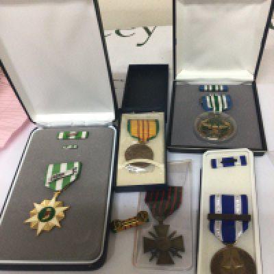 A collection of medals American medals including Vietnam service medal ISAF a Continental I world war medal and others.