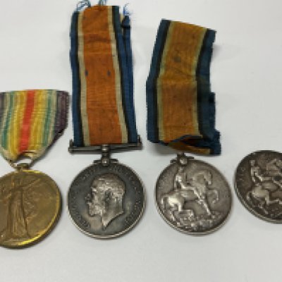 Group of four WW1 medals. 121925 PTE. T. E. PESCOTT. M. G. C. 1914-1919 (1). G- 97194 PTE. B. I. LIGHTER 7- LONDON. R 1914-18 (2). 204186 PTE. V. HUDSON. E. YORK . R. 1914-18 (3). 1806 PTE. J. H. SWINBURNE. E. YORK . R. 1914-18 (4).