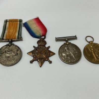 Group of four WW1 medals. 121925 PTE. T. E. PESCOTT. M.G.C. 1914-18 (1). 118489 PNR. J. PARKER. R.E. 1914-15 Star medal (2). G-11803 PTE. D. G. DEARMAN. THE QUEENS R. 1914-18 (3). SE-1785 PTE. F. A. REYNOLDS A. V. C 1914-19 (4).