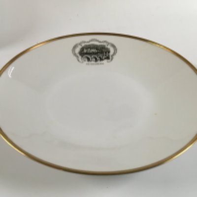 Collection of miscellaneous great liner items consisting of a very rare souvenir butter knife from the old vessel the SS Themistocles, rare find of a souvenir dish from the vessel the RMS Cilicia, very ornate silver ash tray from the vessel MV Bloemfontein, unused photo album from princess lines vessel grand princess, souvenir dish from the vessel the India Star and company plate from the Hamburg America line vessel &#2013266057&#2013265947&#2013266167Heidelberg&#2013266057۪ circa 1970s