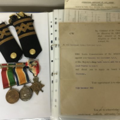 A Group of I world war medals awarded to Sub Lieutenant S Wilkinson RNR. Including 1914-15 star wartime Mercantile medal and British War Medal sold with epaulets buttons and a folder containing History of S Wilkinson.