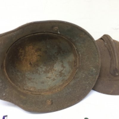 Battle Field Relic finds I world war A German steel M16 pattern helmet a French Helmet and two shell cases 1917. 