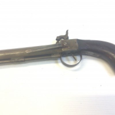 A 19th century Percussion pistol with octagonal barrel with steel belt clip.