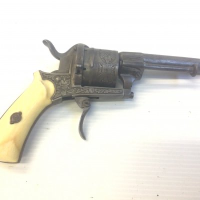 A 19th century Belgium rim fire revolver with an engraved action.