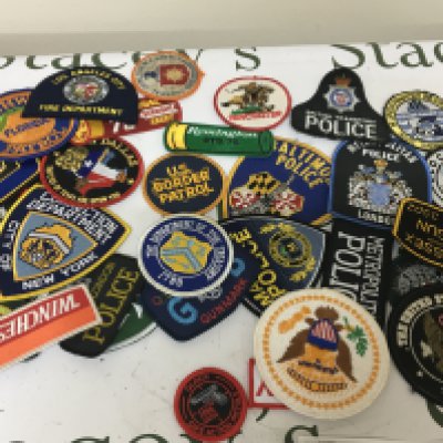 A Collection of Cloth badges American Police and others.