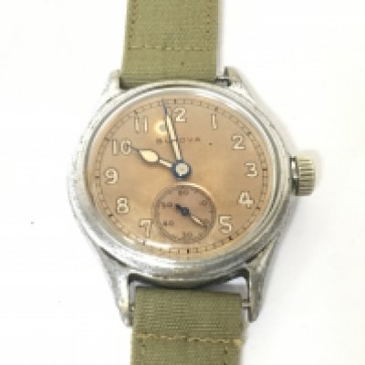 An American Military issue Bulova watch the dial with second subsidiary dial the reverse numbered 141104. Runs then stopes will need movement will need refreshing.