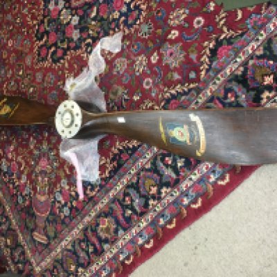 A 2 blade WWI era wooden propeller with possible association to the 84 squadron with various markings with mounting bracket. Approx Length 257cm long.