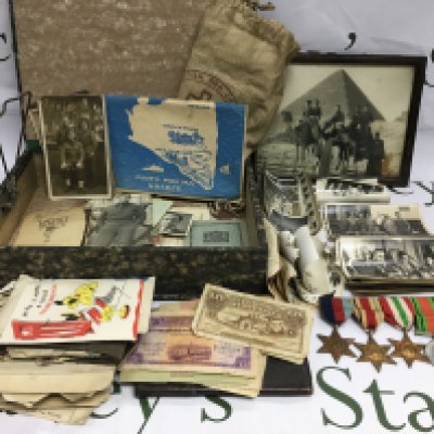 A collection of items pertaining to a WW2 British soldier serving in North Africa comprising medals, photographs and related ephemera. Shipping category B.