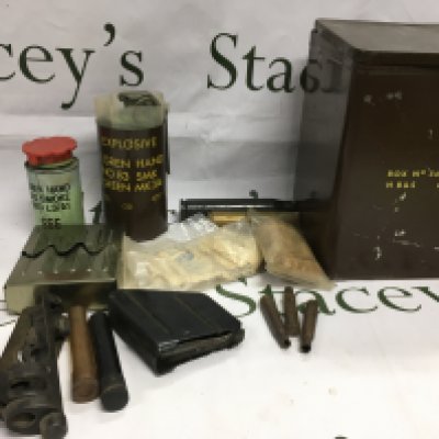Ammunition tin, old shell cases, smoke grenades etc. Shipping category D.