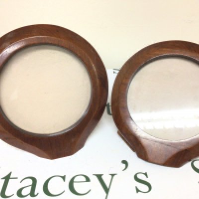 A Pair of I world war period sections of Aircraft wooden walnut propellers polished and converted into picture frames. Height 24cm