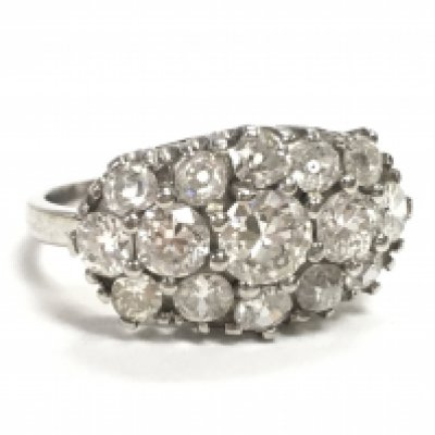 A Platinum and diamond cluster ring, size L. 4.7g Postage category A