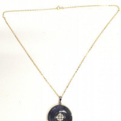 An antique 18ct gold and enamel locket on a 9ct chain, total weight 10.1g. Postage category A