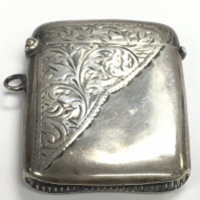 A silver hallmarked vesta case. Postage category A