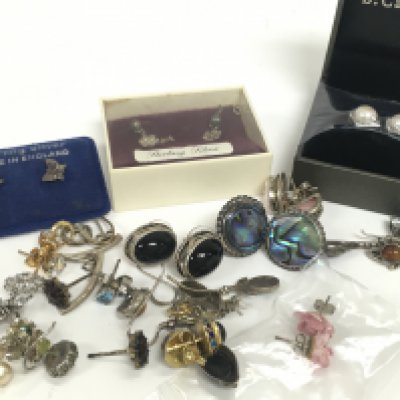 A Collection of silver earrings. Postage category A