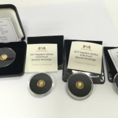 Collection of small gold coins including 2 x 2017 gold proof Quarter Sovereigns with COAs. 6g of 22ct and 1g of 9ct total. Postage B
