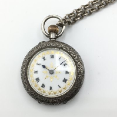 WITHDRAWN - A silver case with enamel face ladies pocket watch with silver belcher style chain. Total weight 53.11g Not seen running. Postage B. NO RESERVE