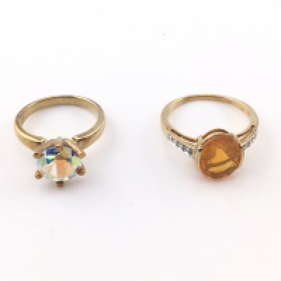 Two 9ct gold rings set with stones. Total weight 7.34g Postage A