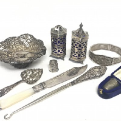 A Collection of silver hallmarked items including silver cased blue s/p glass shakers, a mother of Pearl handled knife, crochet hook etc. This lot cannot be posted.