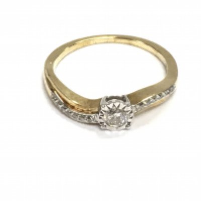 A 9ct gold solitaire style diamond ring with 0.22ct total. Size M and 2.13g Postage A