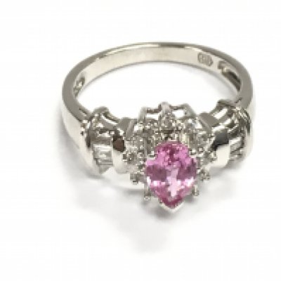 An 14ct white gold pink sapphire and diamond cluster dress ring. Pear shaped pink sapphire 0.50ct and 0.28ct diamonds approximately. Postage A