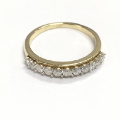 9ct gold half eternity ring set with graduated diamonds approximately 0.50ct. Size Q and 2.51g Postage A