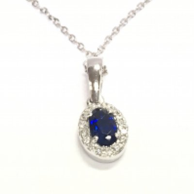 18ct white gold oval sapphire and diamond cluster pendant on 18ct white gold chain. Sapphire 0.39ct and 0.06ct diamonds. Postage A