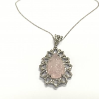 Large silver pendant set with carved pear shaped morganite and diamonds on silver chain. Postage A