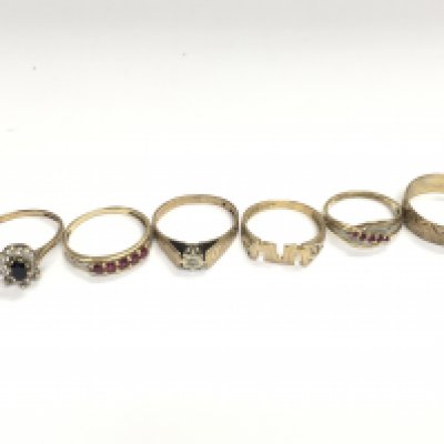 A collection of six 9ct gold rings. Total weight 10.64g Postage A