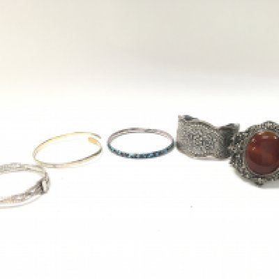 Eastern and silver bangles. Postage category A