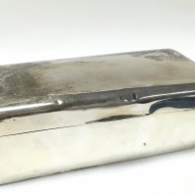 A hallmarked silver cigarette box. 5x9x18cm Postage category B
