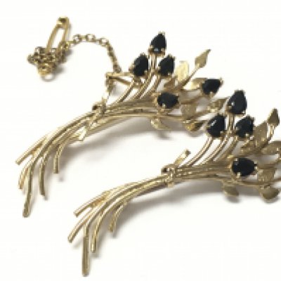 A pair of 9 carat black sapphire stone set brooches , total weight 6.5g. Postage category A
