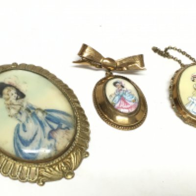 Three vintage Perspex and gilt TLM Lady brooches. This lot cannot be posted. NO RESERVE