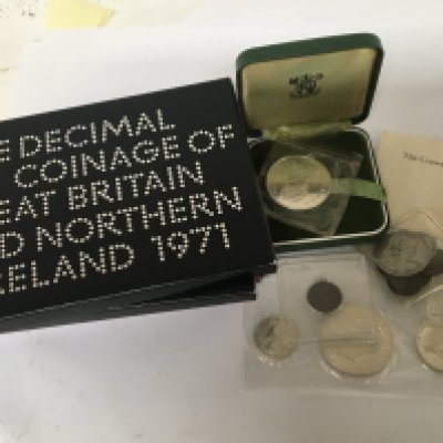 A collection of annual decimal packs slabbed Cased American coins and other coins. NO RESERVE